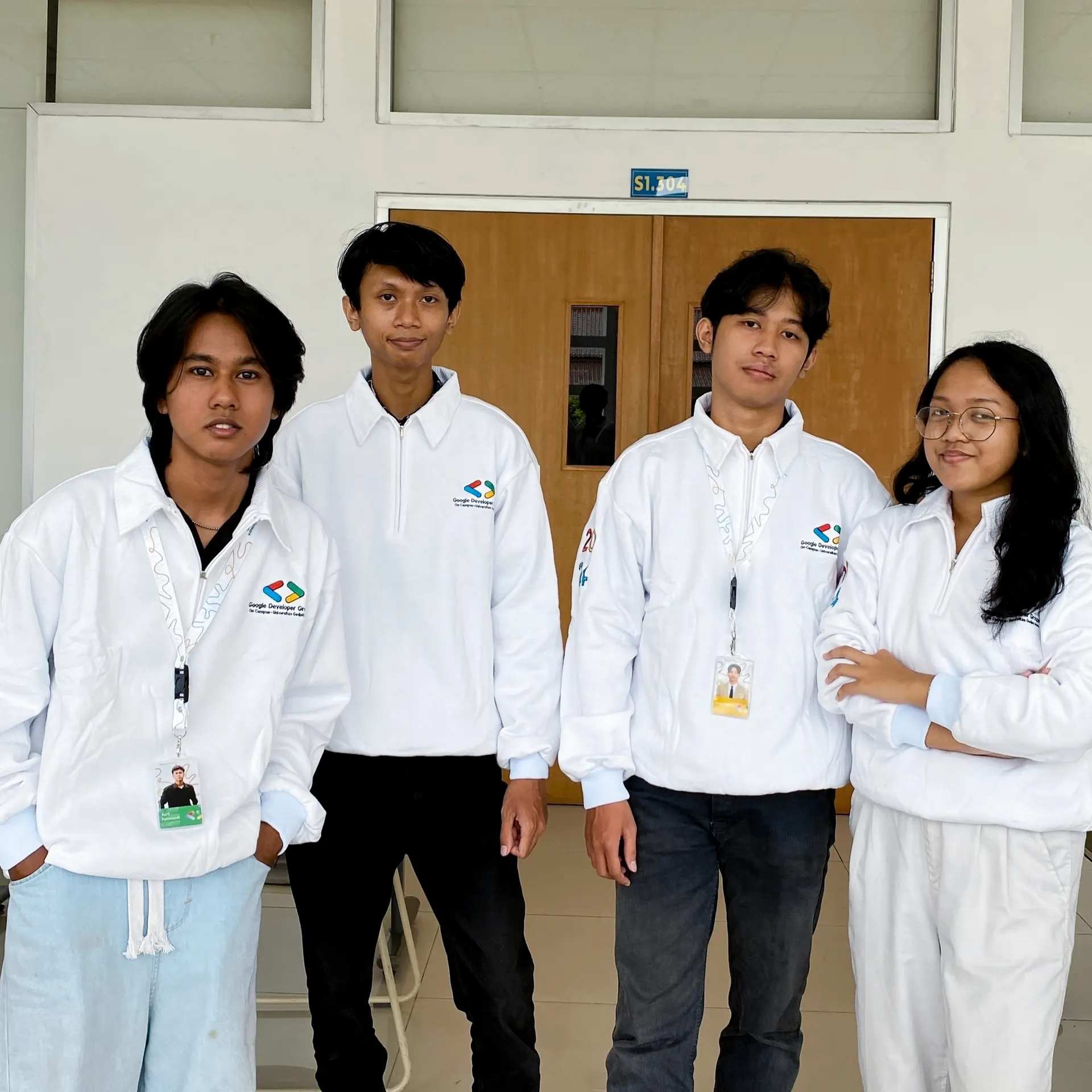 Azril with team Foowaste in matching Google Developer Groups on Campus jackets