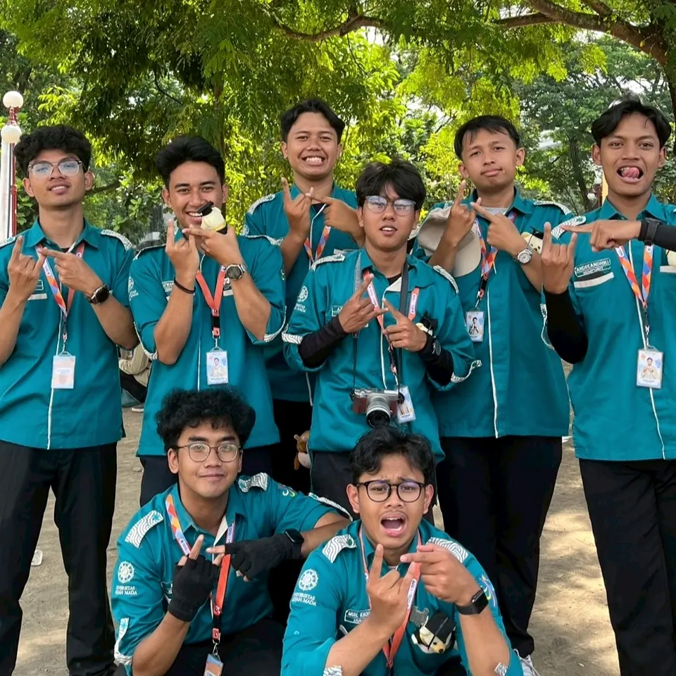 The PIONIR Gadjah Mada IT team in matching green shirts